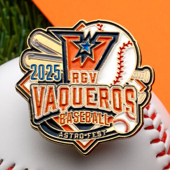Enamel lapel pin for RGV Vaqueros Baseball 2025 Astro-Fest featuring a V logo, baseball bats, and a baseball, resting on a baseball.