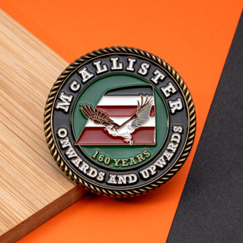 McAllister 160 Years challenge coin with eagle emblem and rope edge detail.