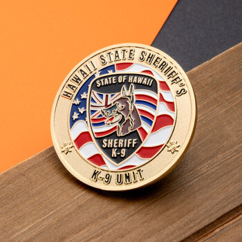 Gold challenge coin for the Hawaii State Sheriff's K-9 Unit featuring a German Shepherd head over a shield with American and Hawaiian flag motifs.