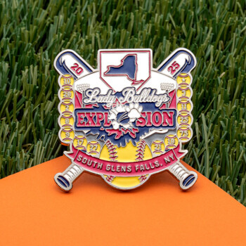 Custom softball trading pin for Lady Bulldogs Explosion South Glens Falls NY featuring crossed bats, softballs, and a New York state map outline.