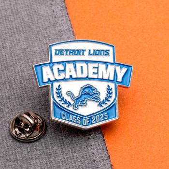 Detroit Lions Academy Class of 2025 enamel lapel pin with butterfly clutch backing on gray and orange background.