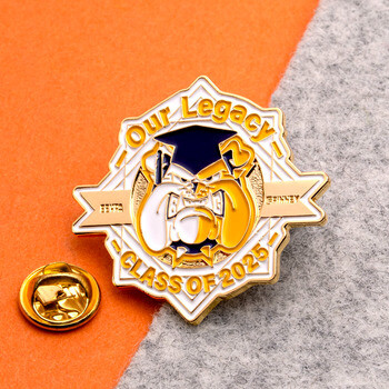 Gold and white lapel pin featuring an English bulldog wearing a graduation cap, reading Our Legacy Class of 2025 with butterfly clutch back.