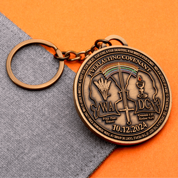 Antique bronze keychain challenge coin featuring the Everlasting Covenant design with rainbow and sword motifs.