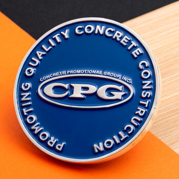 Round blue enamel challenge coin for Concrete Promotional Group Inc CPG with silver lettering.